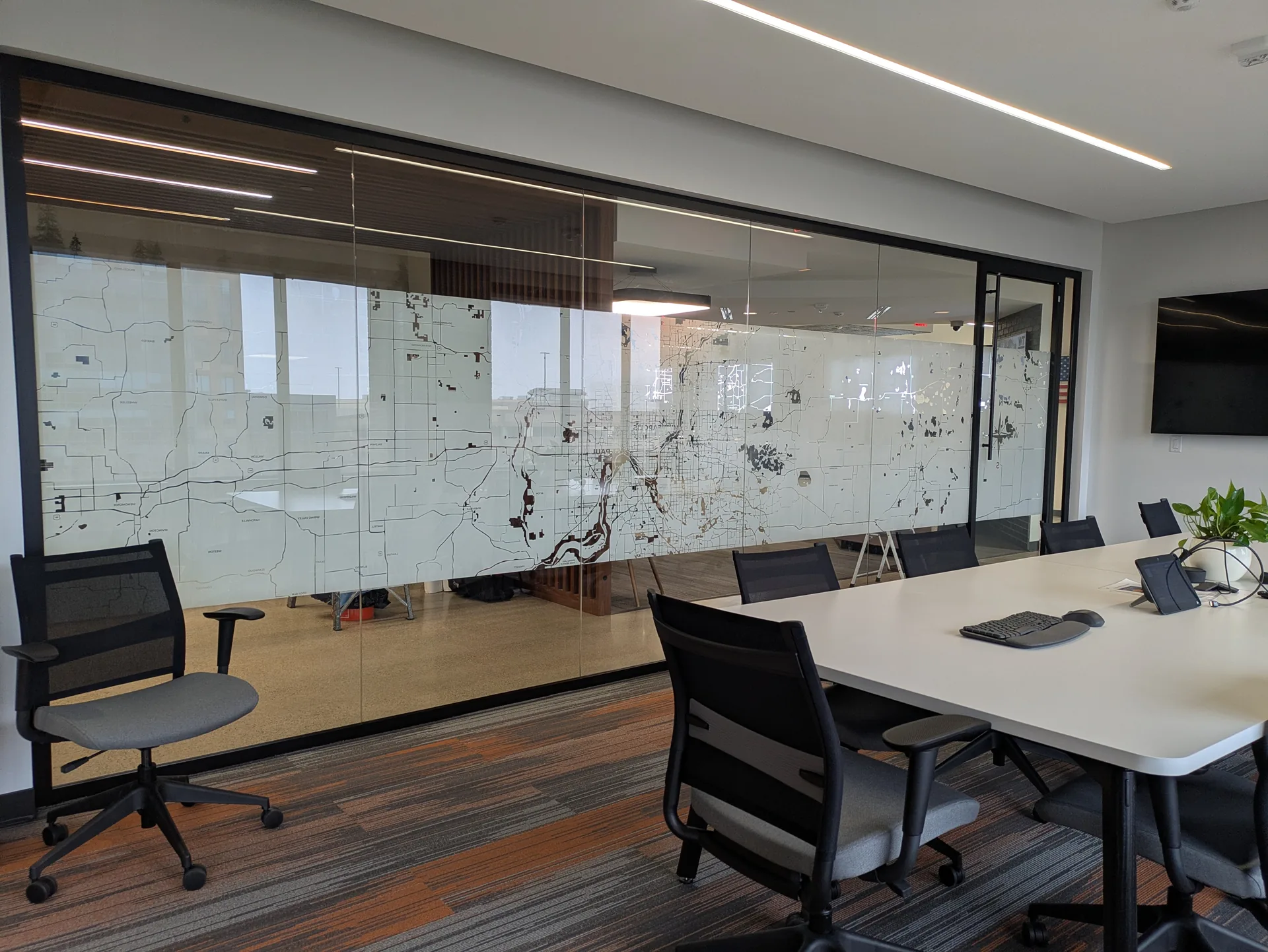 Conference room glass wall with decorative frosted window film (interior)