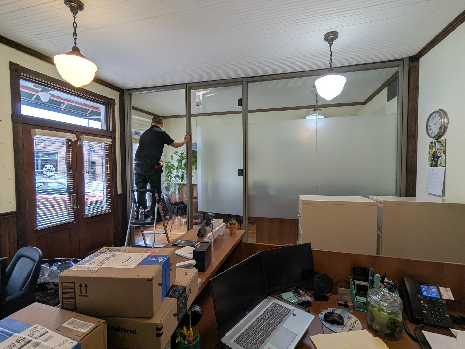 Office glass wall with frosted window film