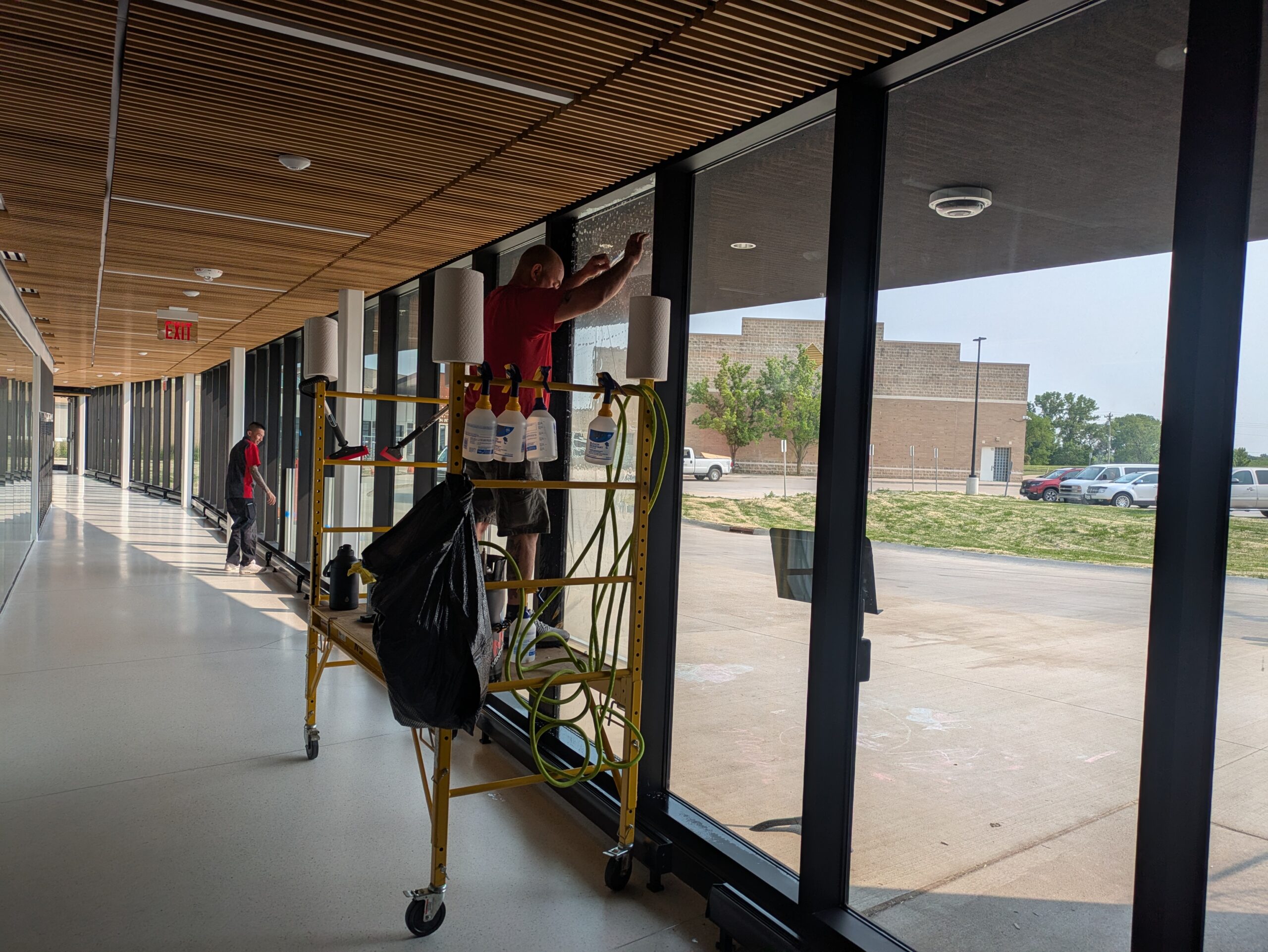 Security window film installed on glass by Window Films Co.