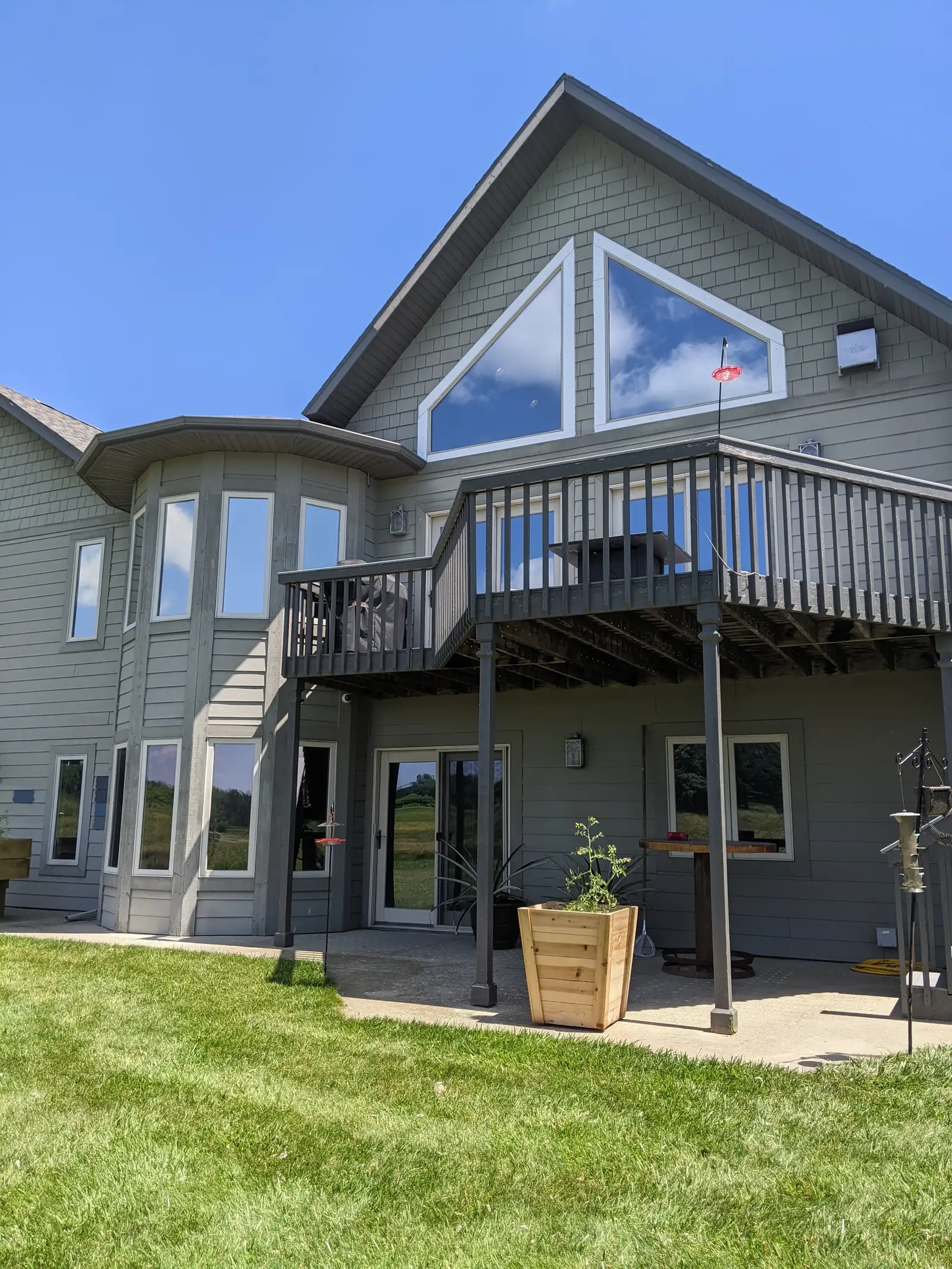 Okoboji home windows with DR15 glare control film (exterior)