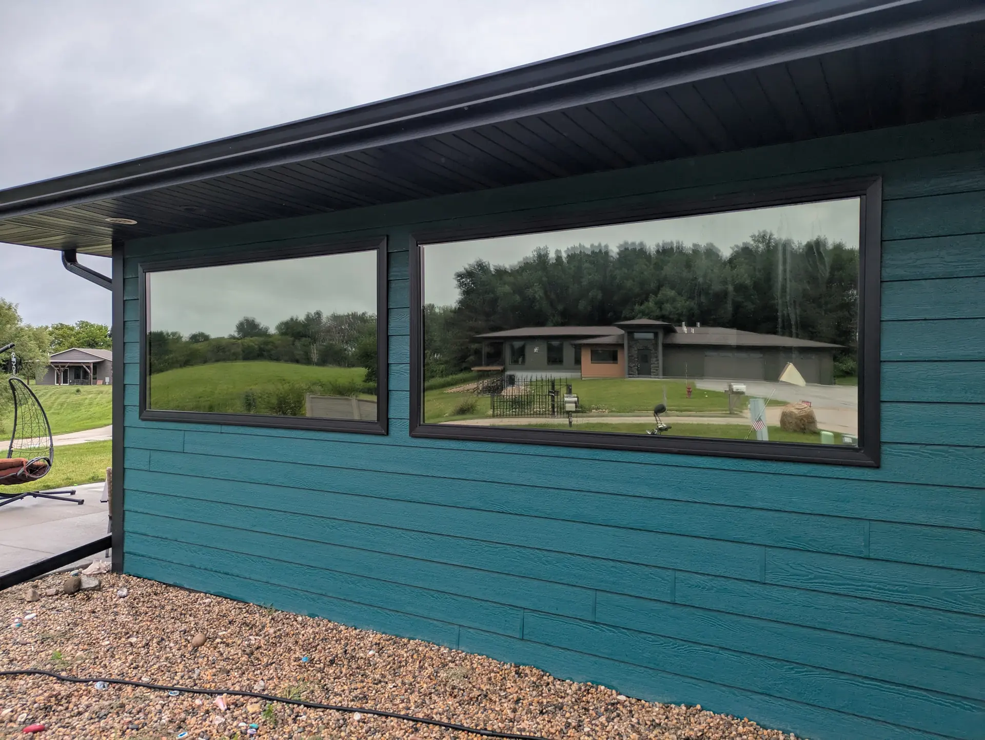 Milford home windows with DR05 solar control film (exterior)